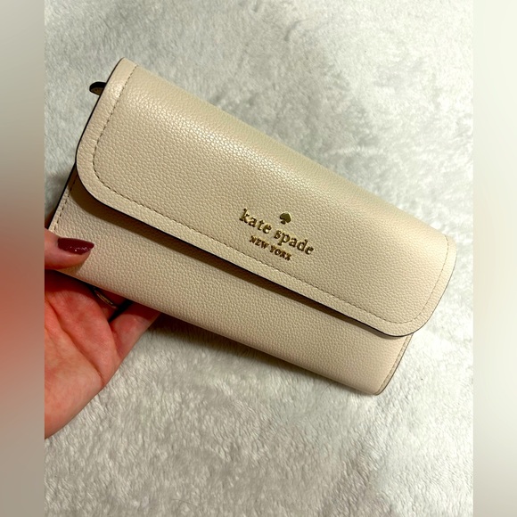 kate spade Handbags - Kate Spade New York Pebbled Leather Large Flap Wallet Rosie